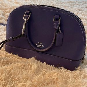 Coach Sling Purse. Deep purple in color